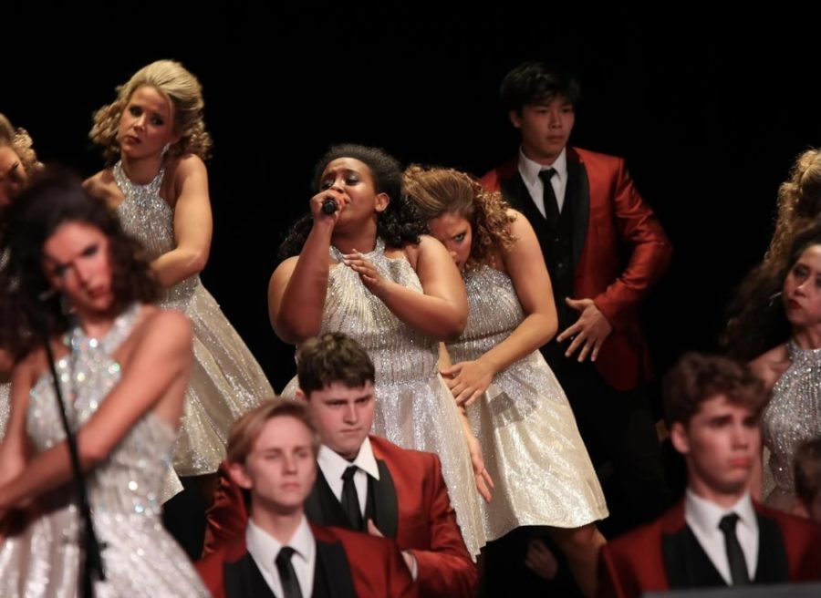 Michelle Kagwima singing a solo at the Jasper Foothills Show Choir Classic (photo by Anna Kittinger).