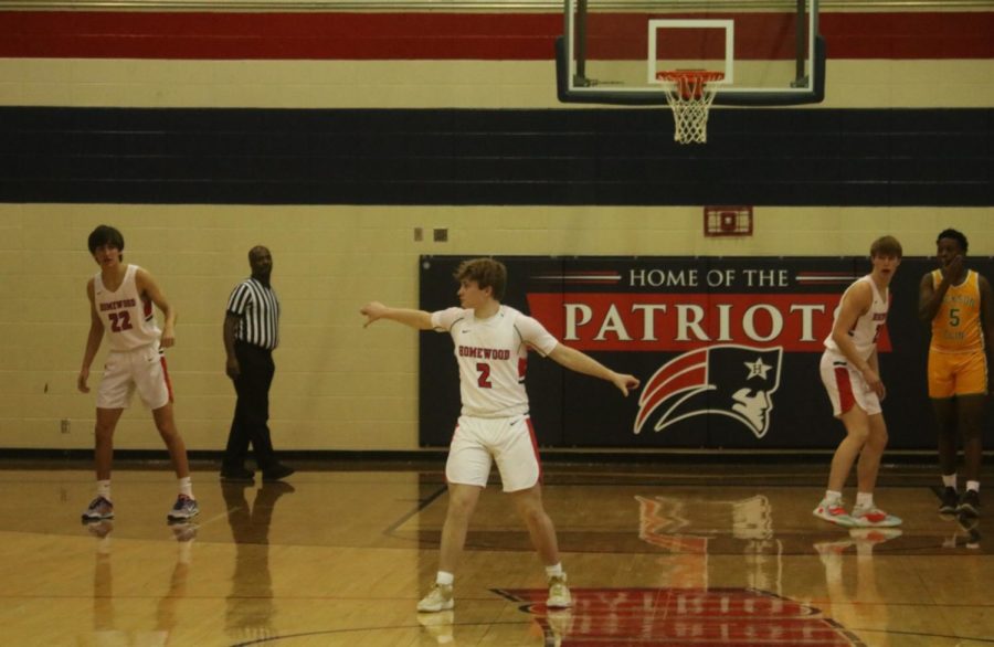 Carter Vail (SR) directs traffic on defense (photo by Russell Dearing)