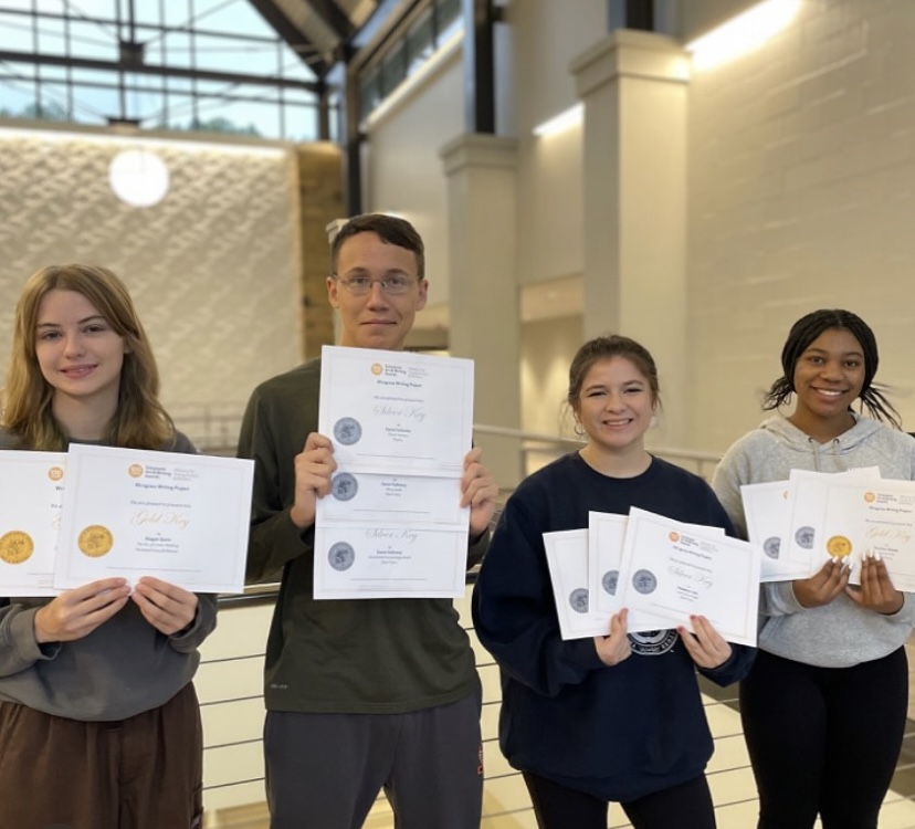 Creative Writing III students pose with their Scholastic certificates (photo by Amy Marchino).