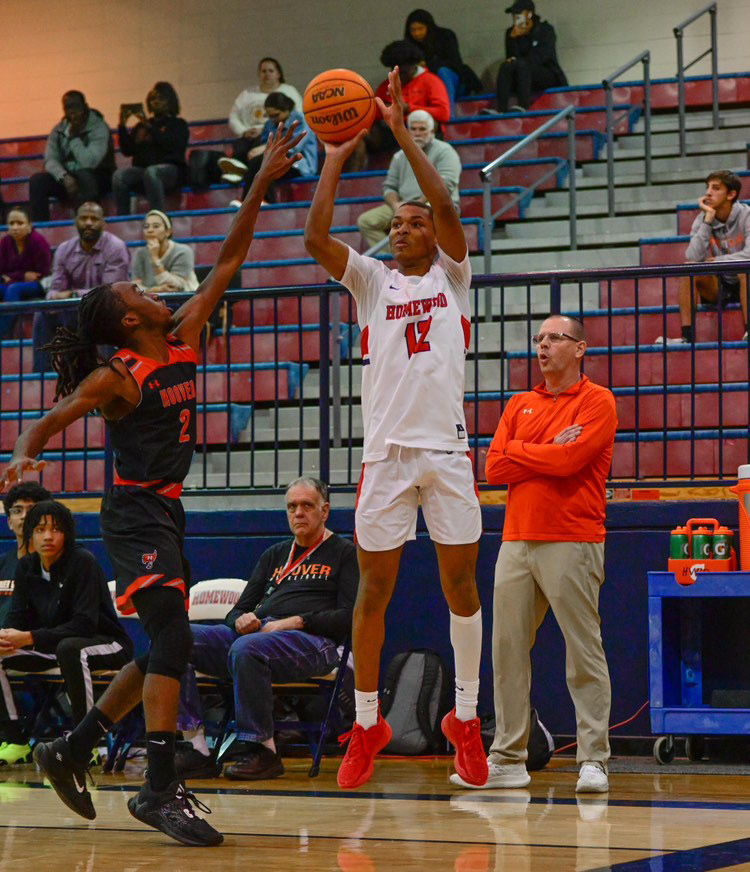Armstead shooting a 3-pointer against Hoover. (photo by Russell Dearing)
