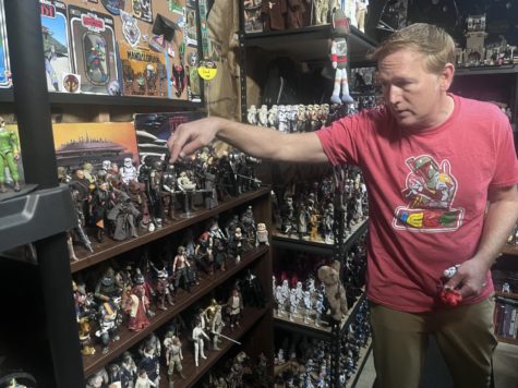HHS English teacher and avid Star Wars fan Chad Cooley shows off a small fraction of his toy collection. 