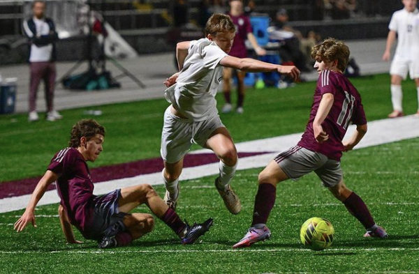 Will Jackson dribbles past two Gardendale players in the third round of the 2023 playoffs in a 3-0 victory.