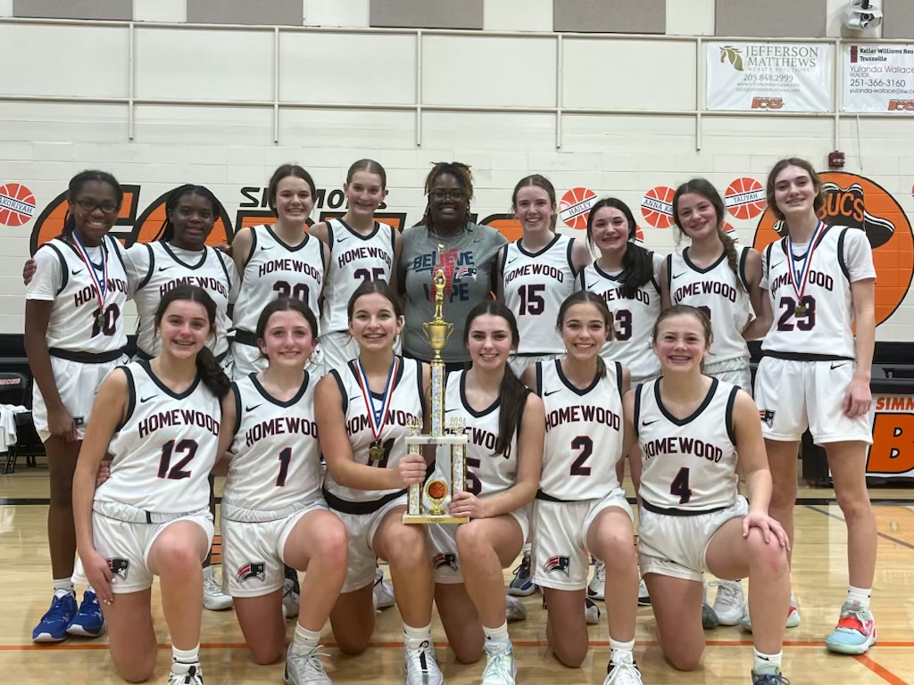 The girls basketball team after winning the metro championship.