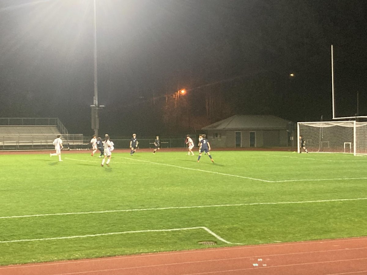 Haines Durkin unleashes a shot into the top corner of the net against area opponent Parker on March 6. Durkin scored two goals in the Patriots 10-0 victory.