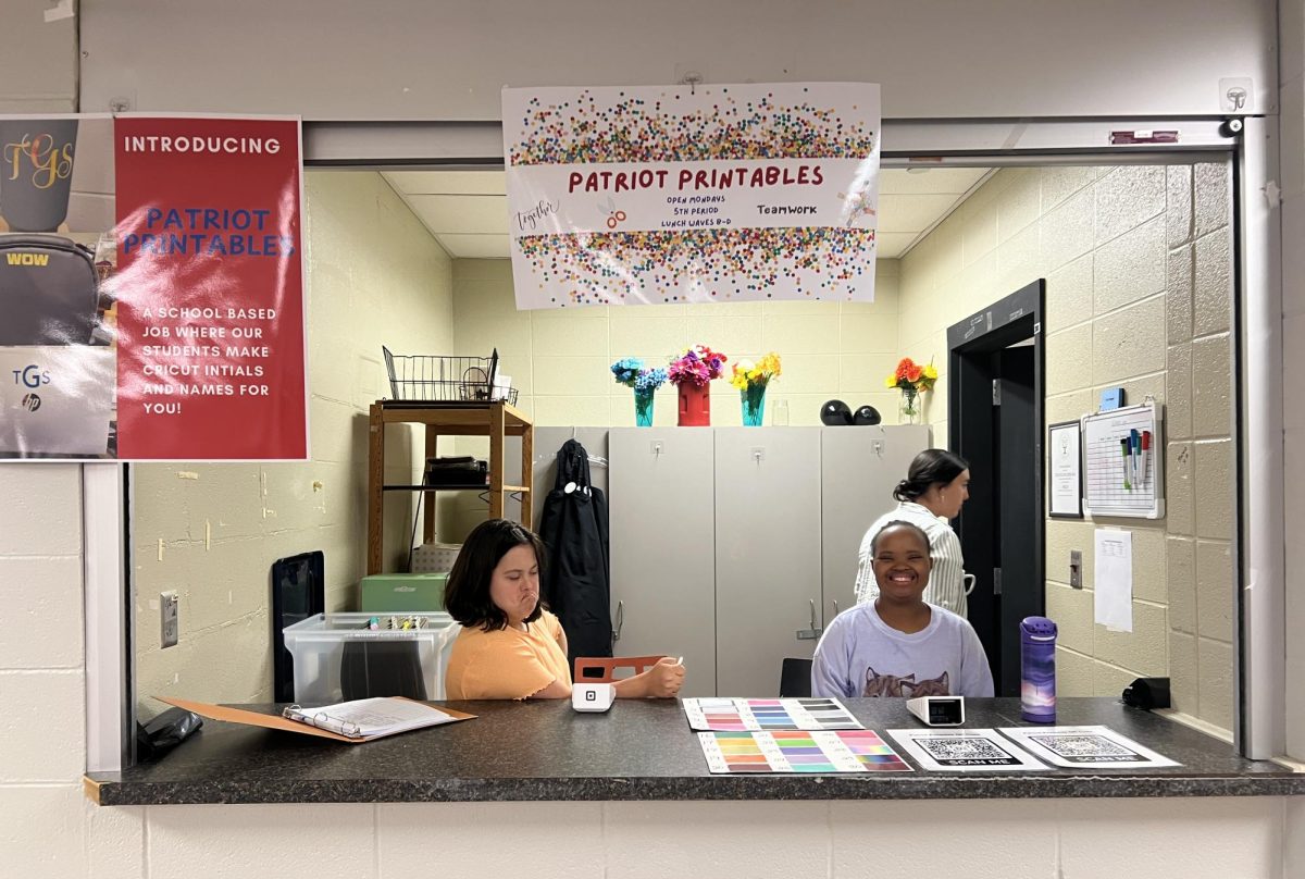 Students working hard at the Patriot Printables booth in the HHS lunchroom.