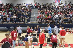 Homewood High school students play musical chairs during pep rally. 