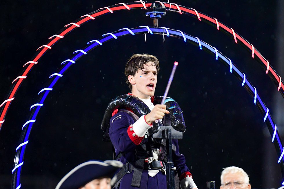 Jack Mitchell plays the drums inside the gyroscope during the band's halftime show. The drummer recently went viral for his performance.