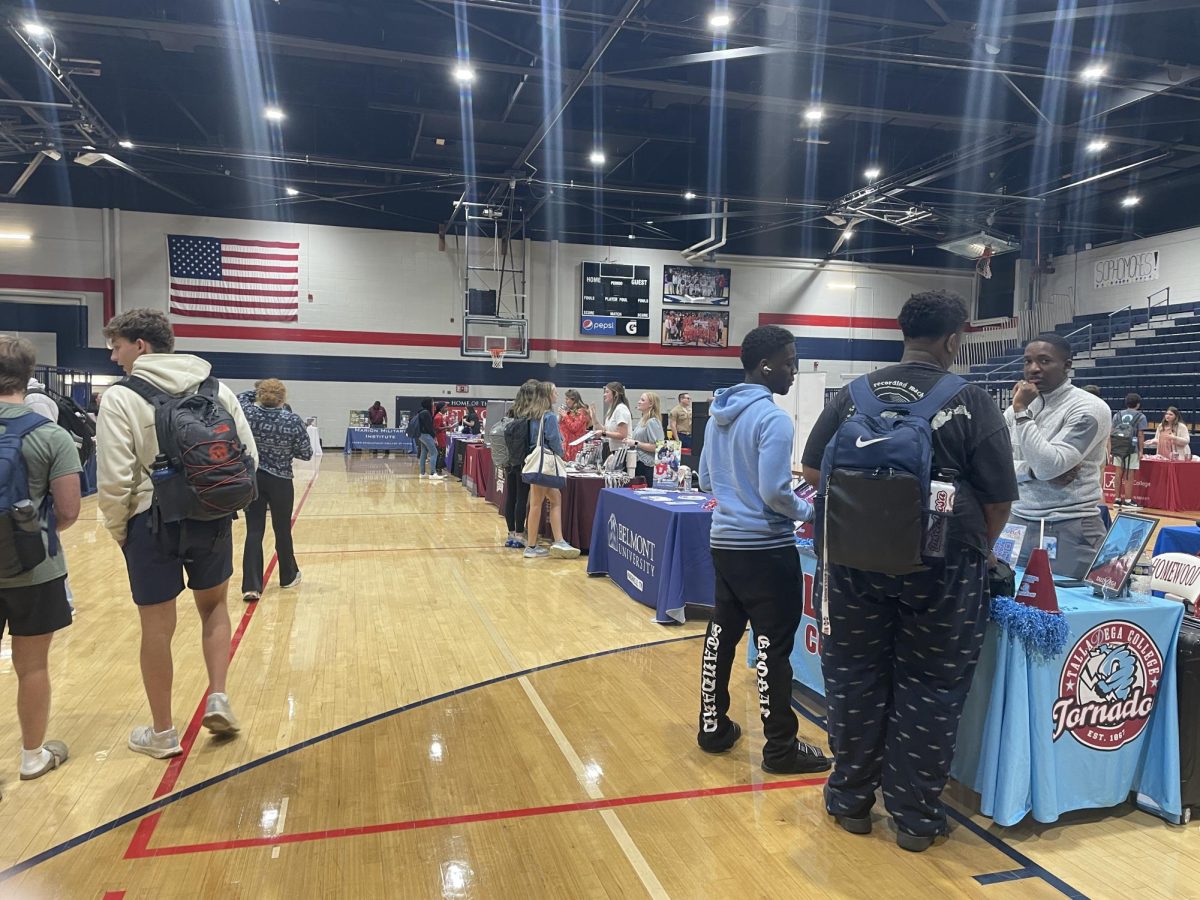 Homewood High School students browse the many informational tables available at the college fair. 