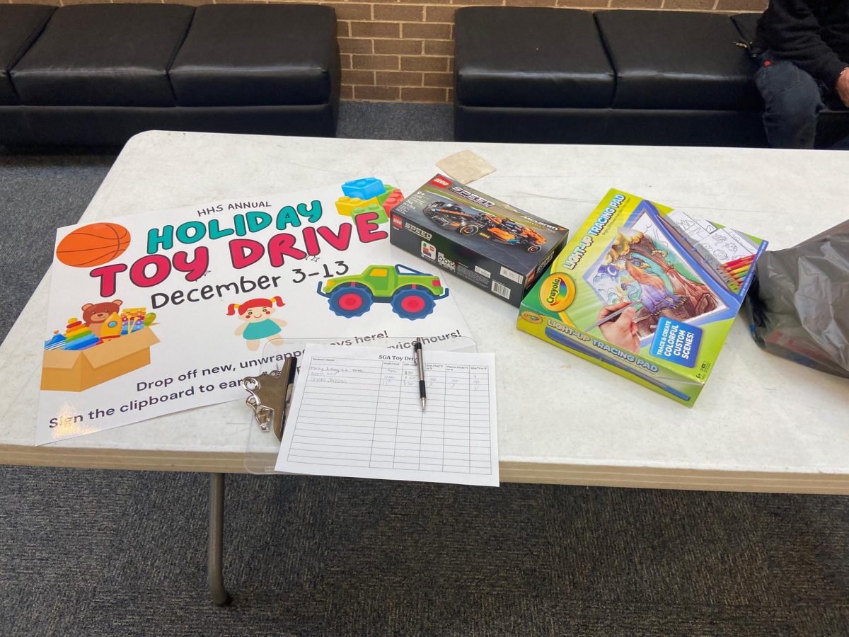 Holiday Toy Drive collection table in the back office. 