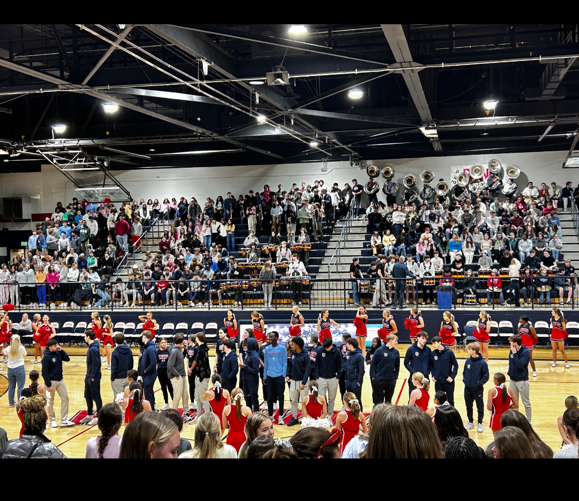 The varsity basketball teams being introduced at the Hoopscoming pep rally.