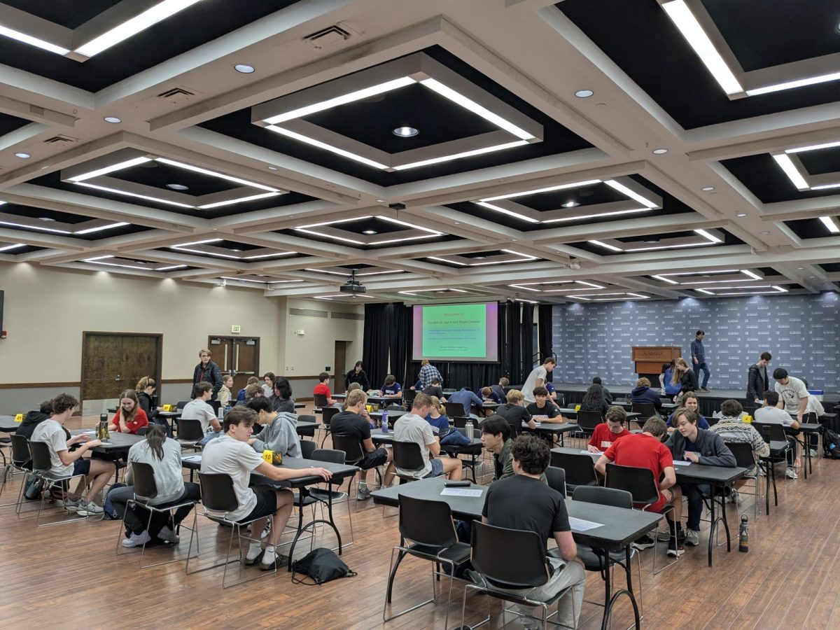 Physics students work on problems during the Feb. 7 competition in the Ferguson Center at the University of Alabama. 