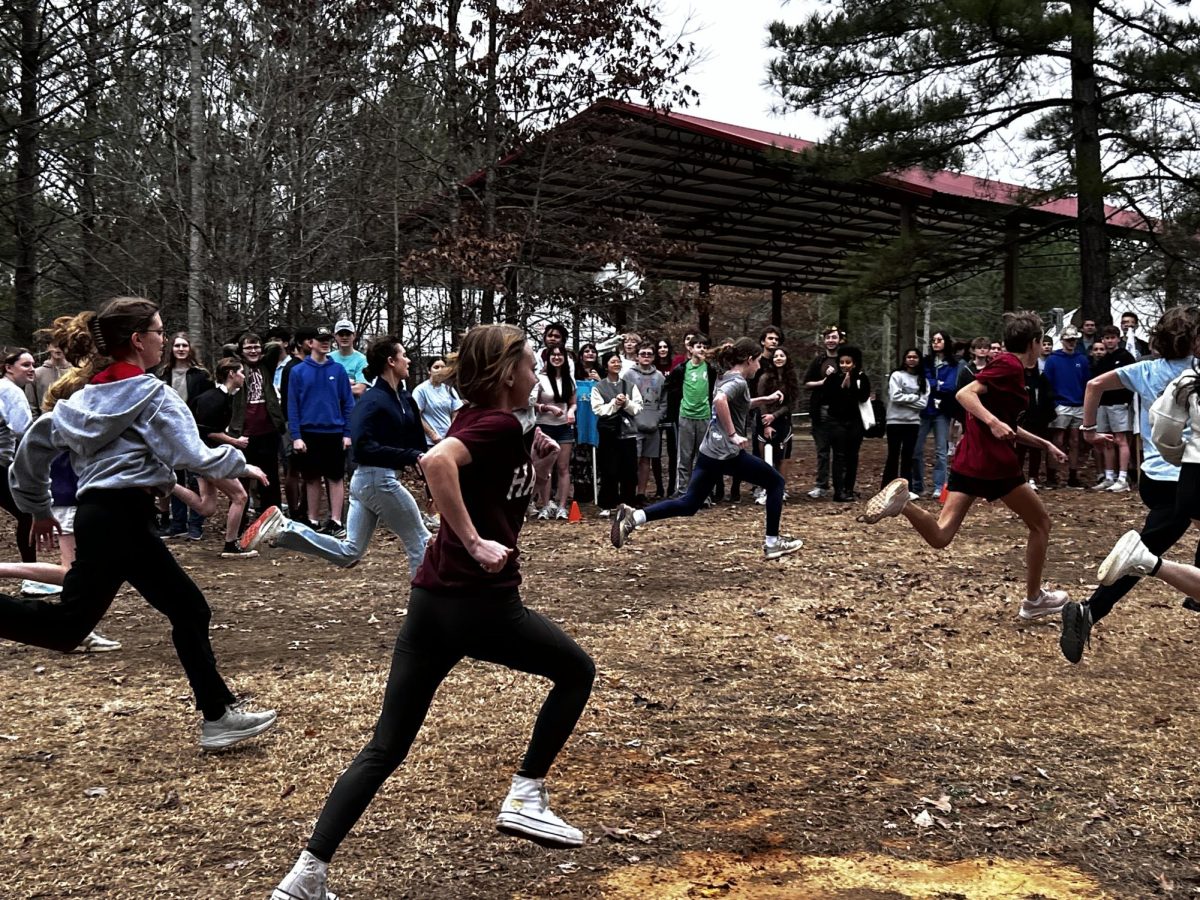 Sophomore Ashe Moran competes in the girls footrace.