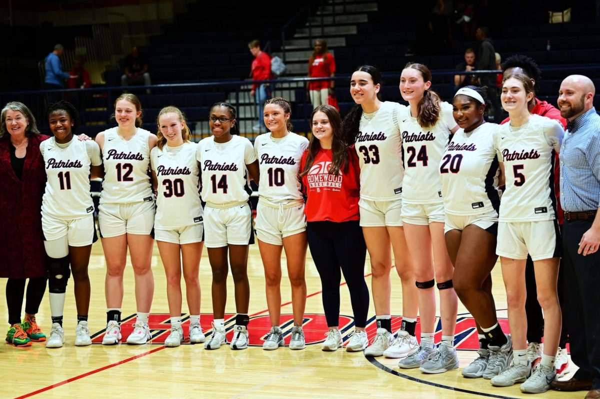 The Patriots posing after their 62-48 win over Huffman in the basketball subregionals.