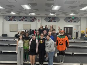 Behind the curtain: stage crew aids in show choir success