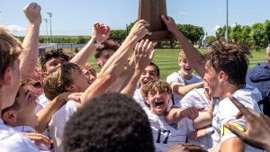 Boys varsity celebrates winning the 6A state championship in Huntsville. The team beat Spanish Fort 3-1.