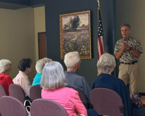 Senior audience listens to Sepsas about the trains in Inca. The Inca empire developed an extended road system that elongates up to 2 million square kilometers, including bridges, staircases and tunnels.