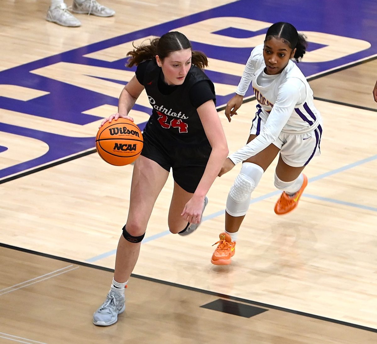 Lane Crowe dribbles away from her Villa Rica opponent. Crowe is currently undecided on where she will play in college next year. 