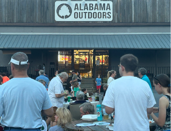 Community gathers for monthly party at Alabama Outdoors for their 50th anniversary. Alabama Outdoors hosts the first Friday of every month to promote local companies and volunteer opportunities. 