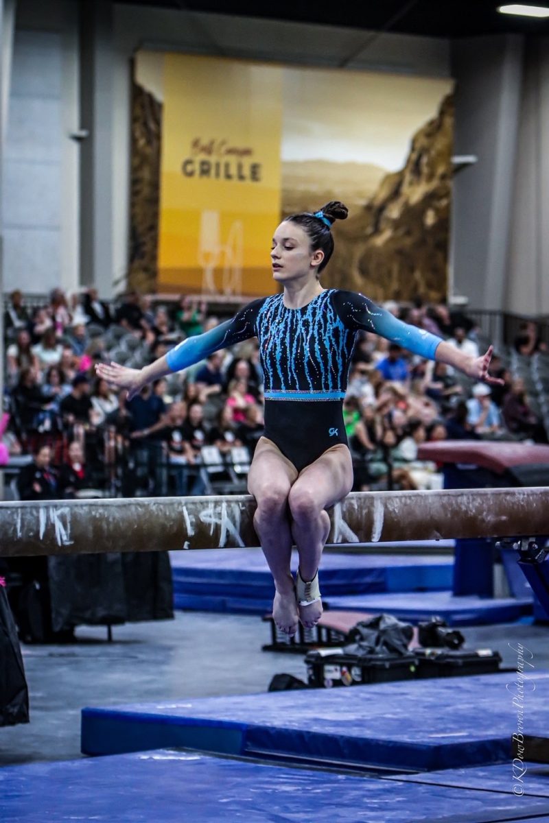 Mary Vines competes at the pre-elite level on a balance beam. Her performances at tournaments across the country garnered attention from several colleges and universities.