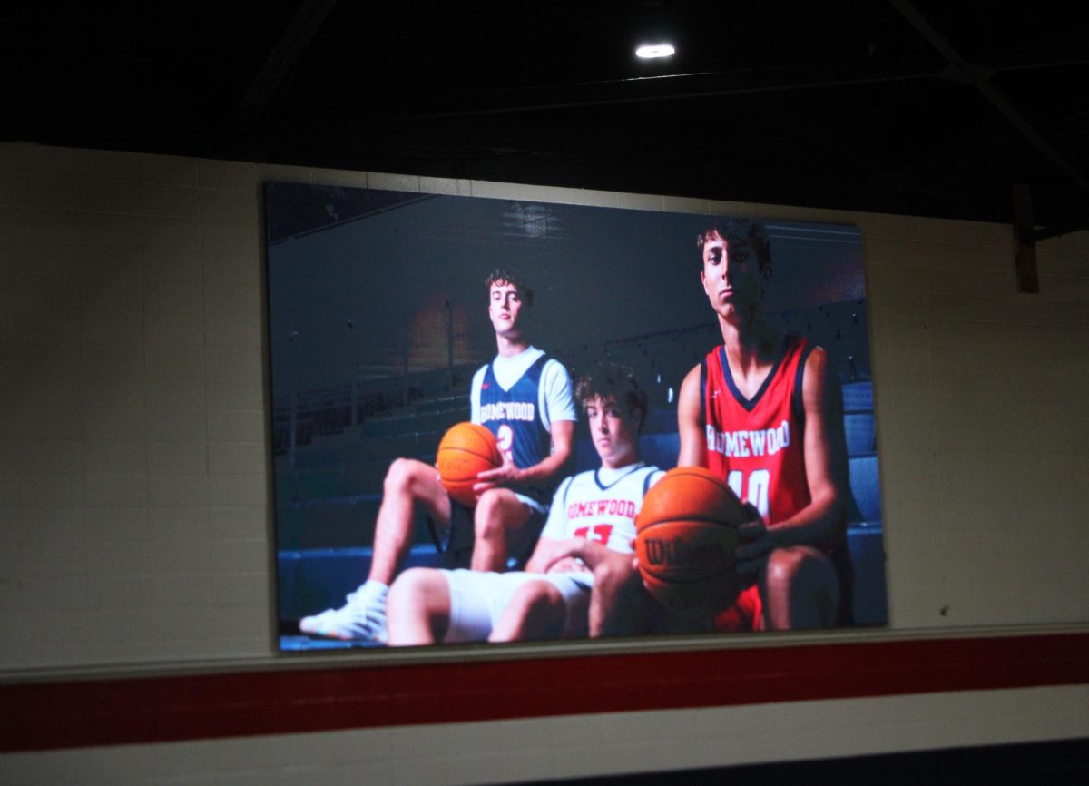 Homewood's new video board displays basketball players during their home opener against the Central Falcons. The  new video board is designed to increase fan experience and show off students' capabilities. 