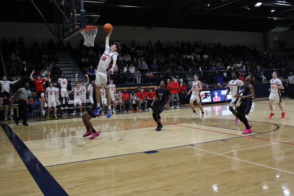 Senior Jace Harden scores against Shades Valley. Homewood won the game 38-36.