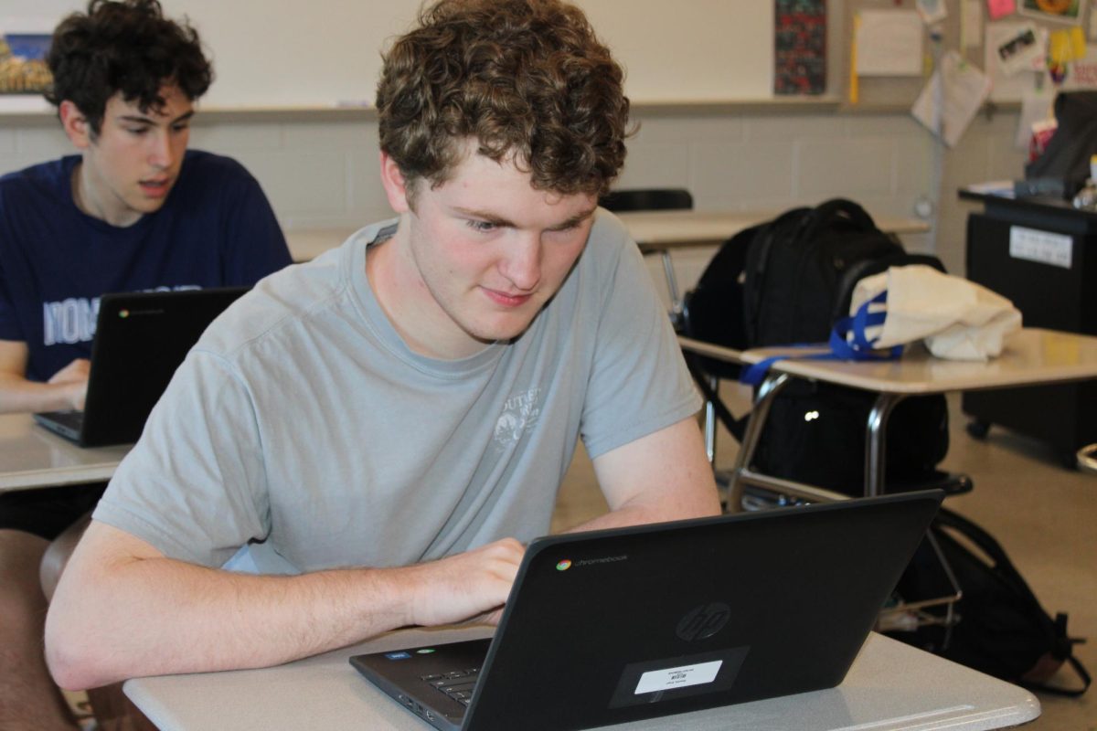 Junior Engil Shanks plays QB Reader during Scholars' Bowl practice. The team meets every Tuesday afternoon to practice.