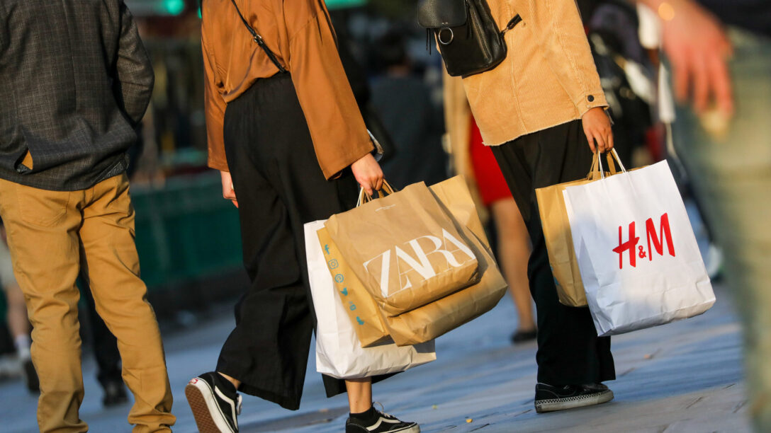 Several shoppers carry bags from known fast fashion retailers like Zara and H&M. Fast fashion contributes to the 85% of textiles that end up in landfills per year, according to Business Insider